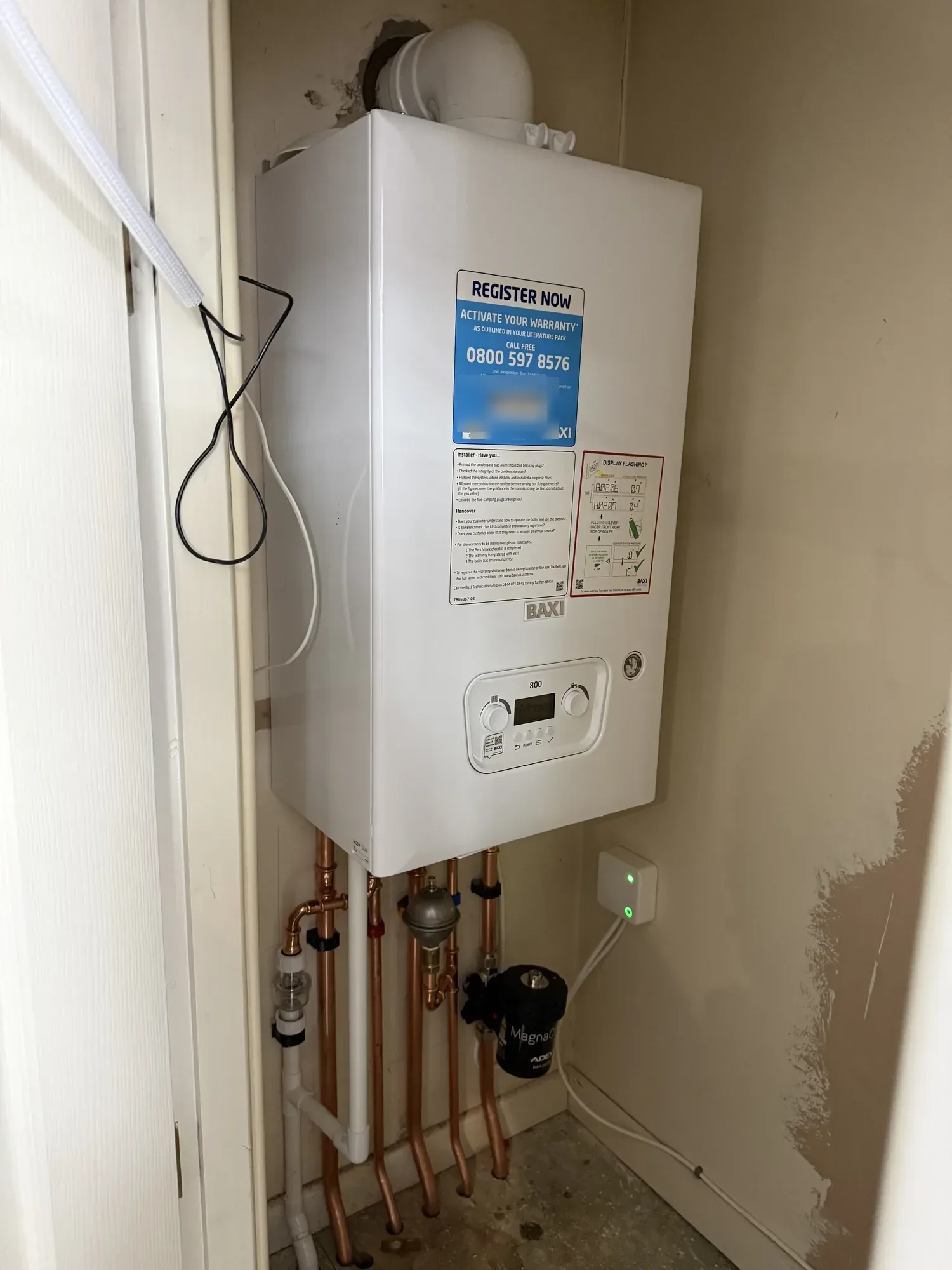 New Baxi combi boiler with neat copper pipework and filter