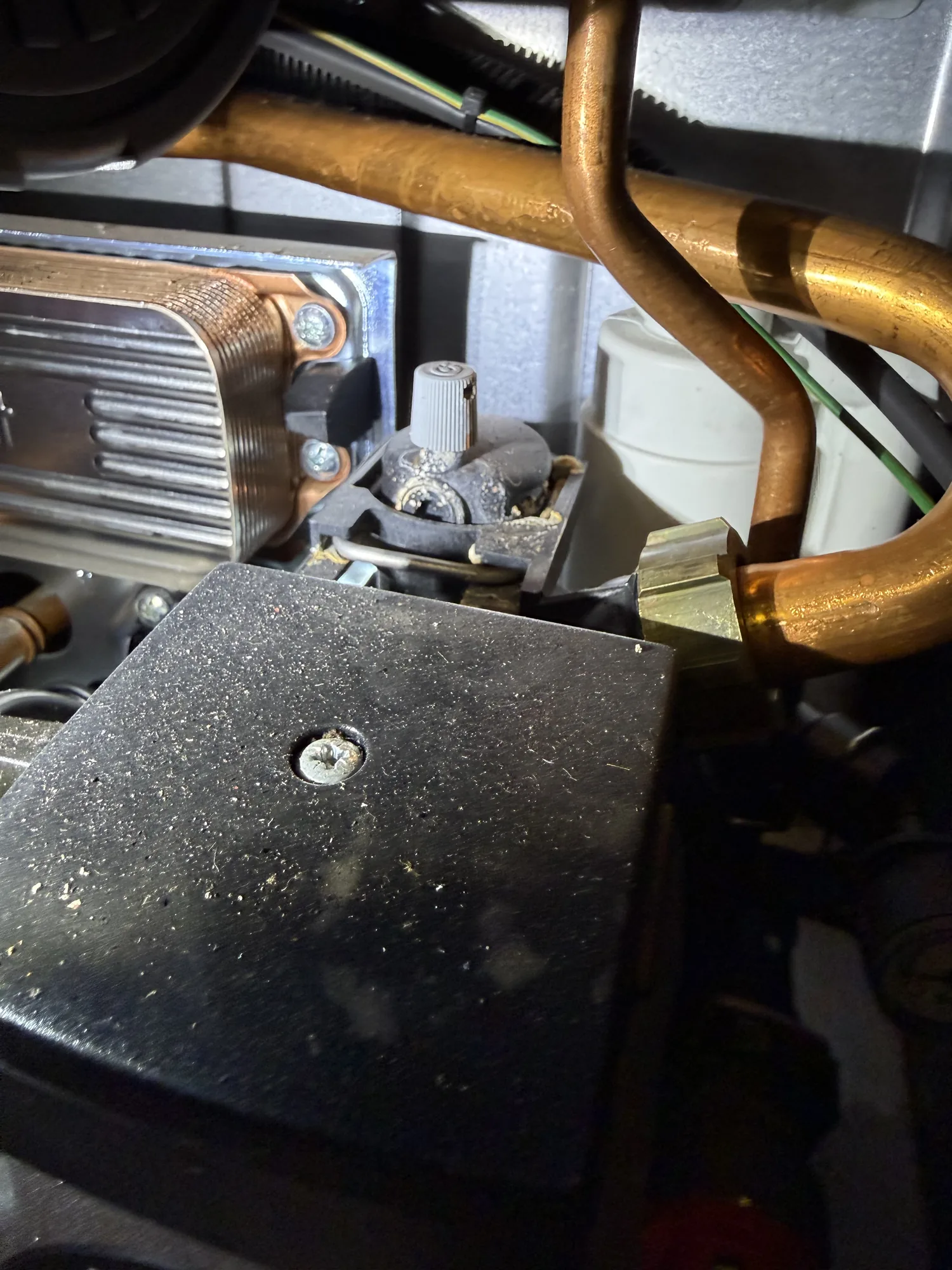 Close-up of boiler internals during a breakdown repair