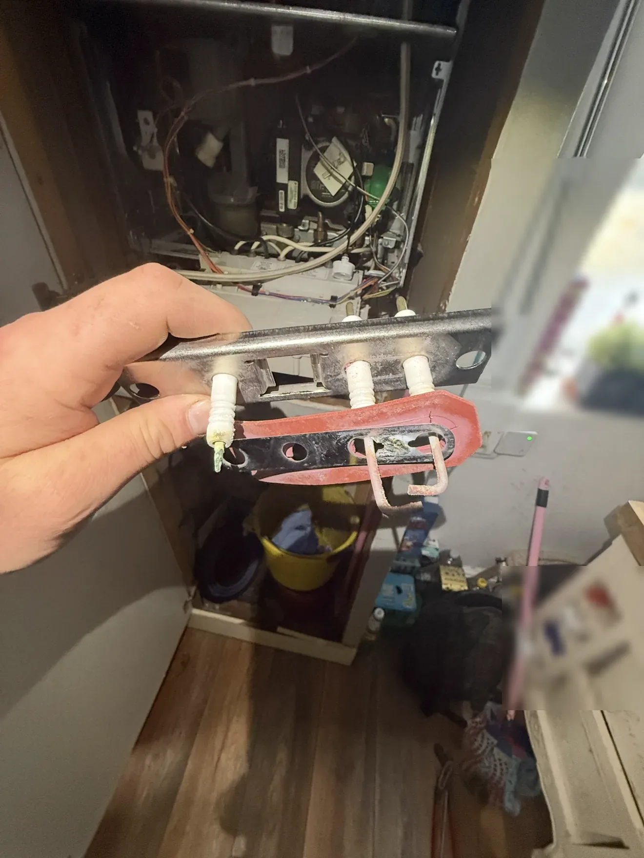 Burner electrode assembly removed during a boiler service